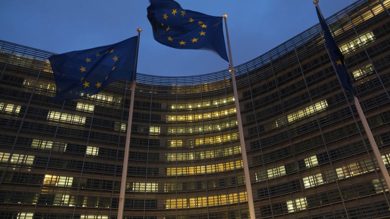 Flags of the European Union fly outside the Berlaymont building of the European Commission