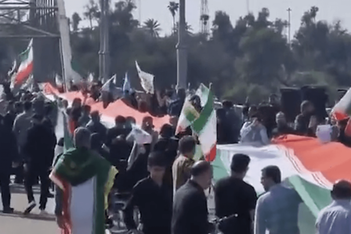 Flags of the regime were raised on bridges