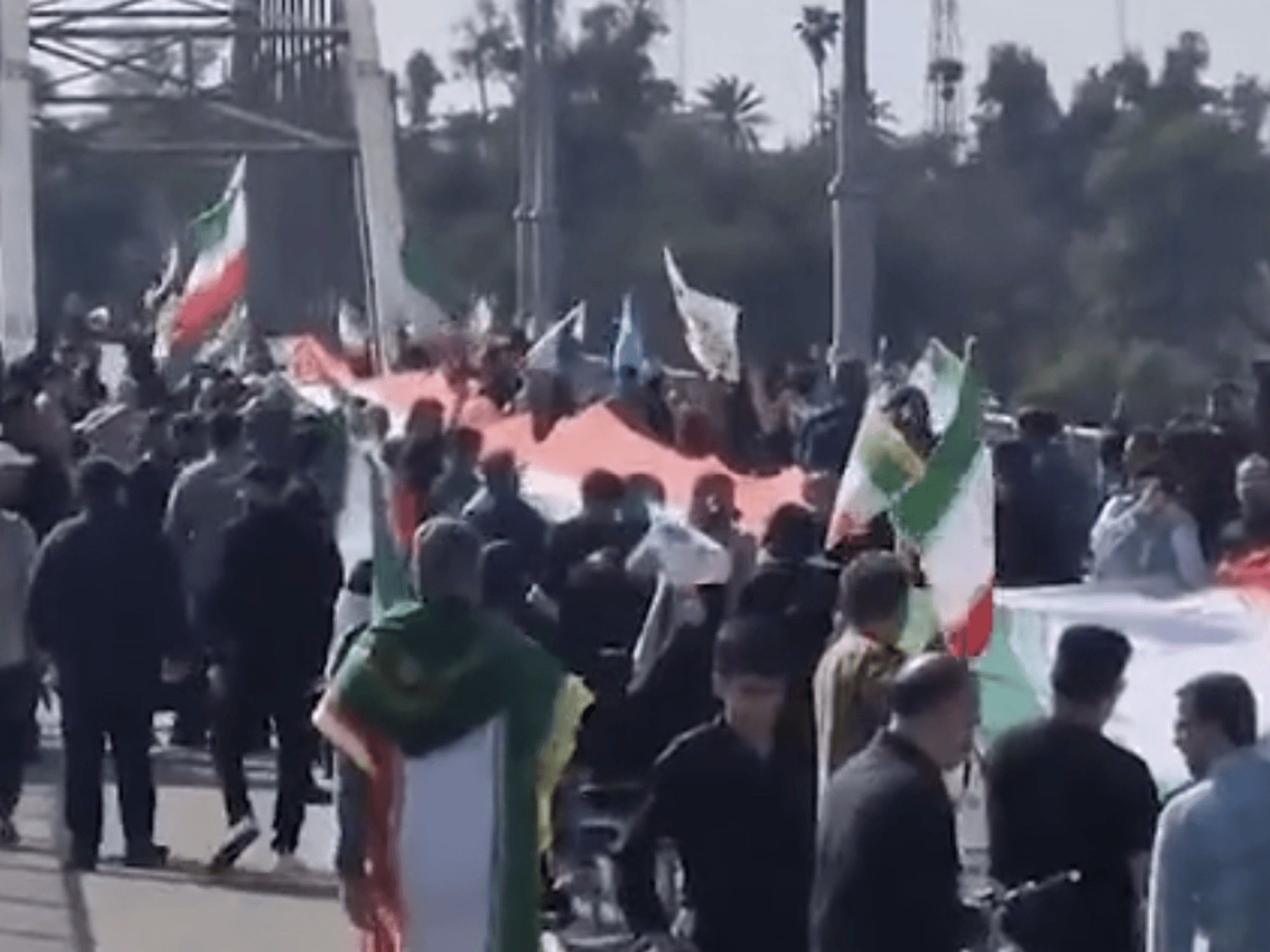 Flags of the regime were raised on bridges