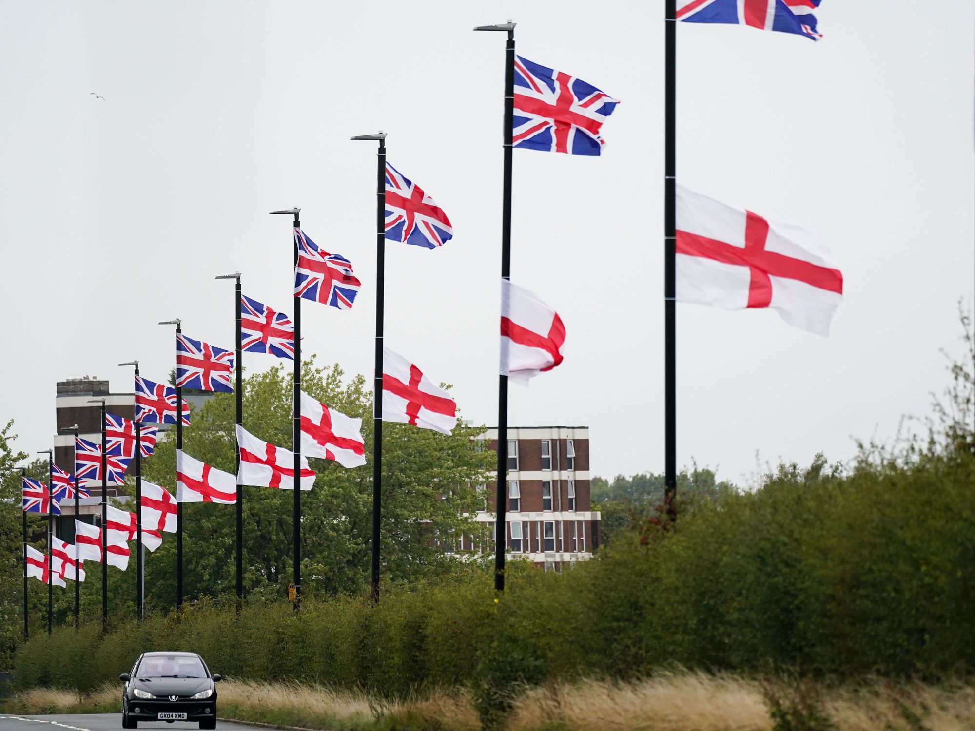 Flags raised on lampposts