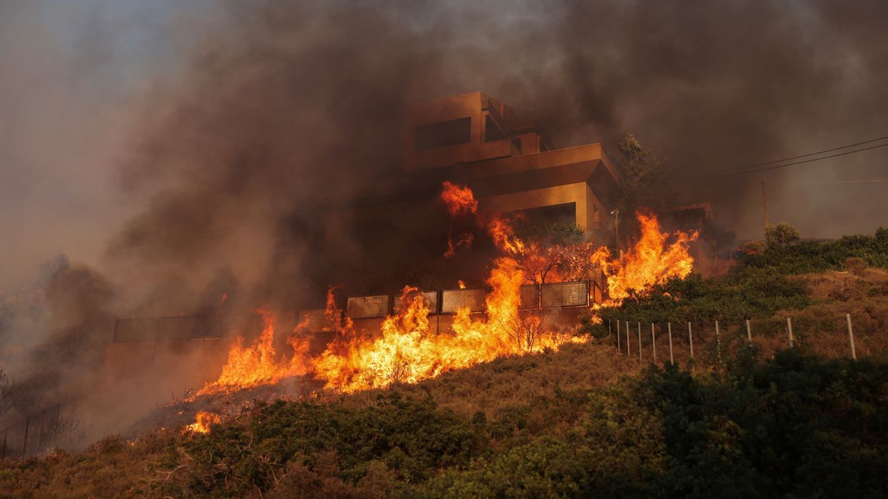 Popular Greek seaside resort evacuated as wildfires spread