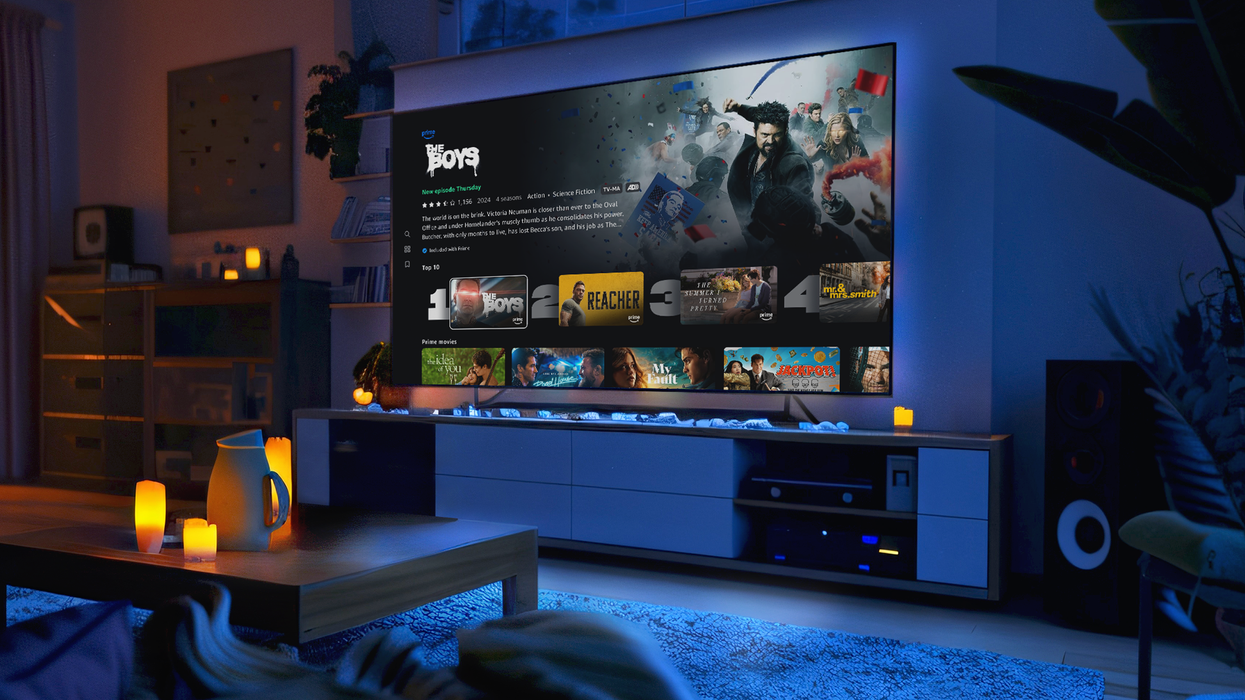 flatscreen tv mounted on the wall with the prime video interface on-screen