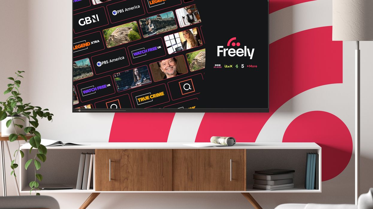 flatscreen TV on the wall with gb news logo