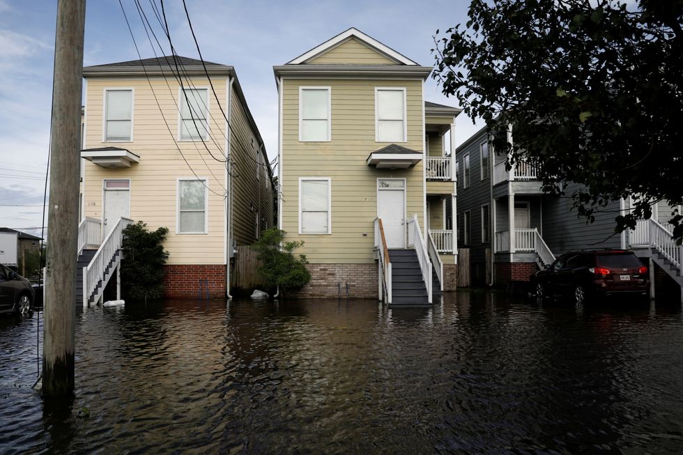 Flooded homes front yards are seen after Hurricane Ida made landfall in Louisiana, in New Orleans, Louisiana.