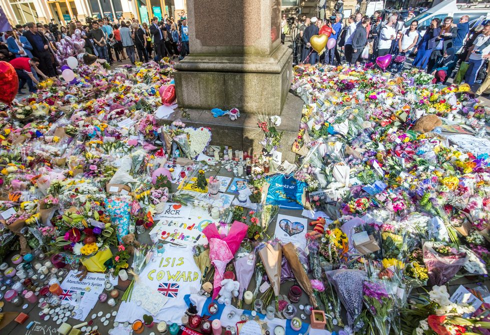 Floral tributes in St. Ann's Square, close to the Manchester Arena where Abedi killed 22 people.