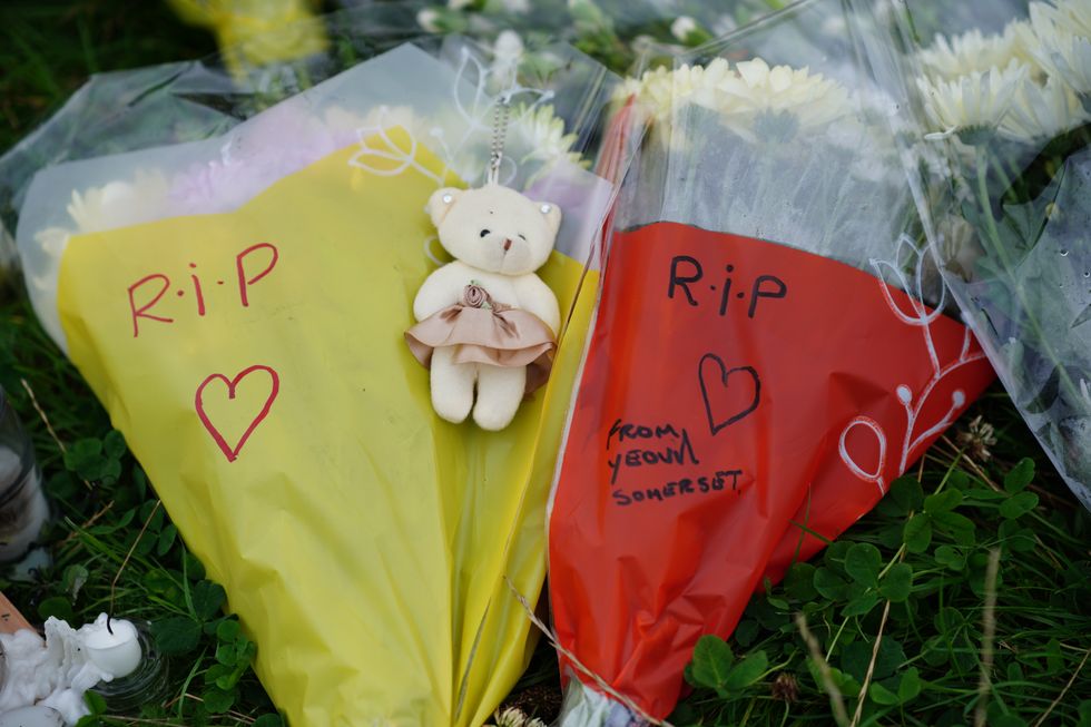 Floral tributes left in the Keyham area of Plymouth where six people, including the offender, died of gunshot wounds in a firearms incident Thursday evening.