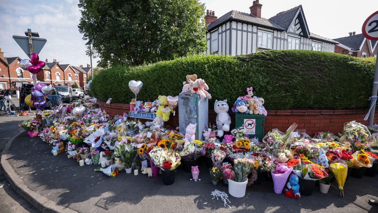 Floral tributes on the junction of Tithebarn Road and Hart Street in Southport