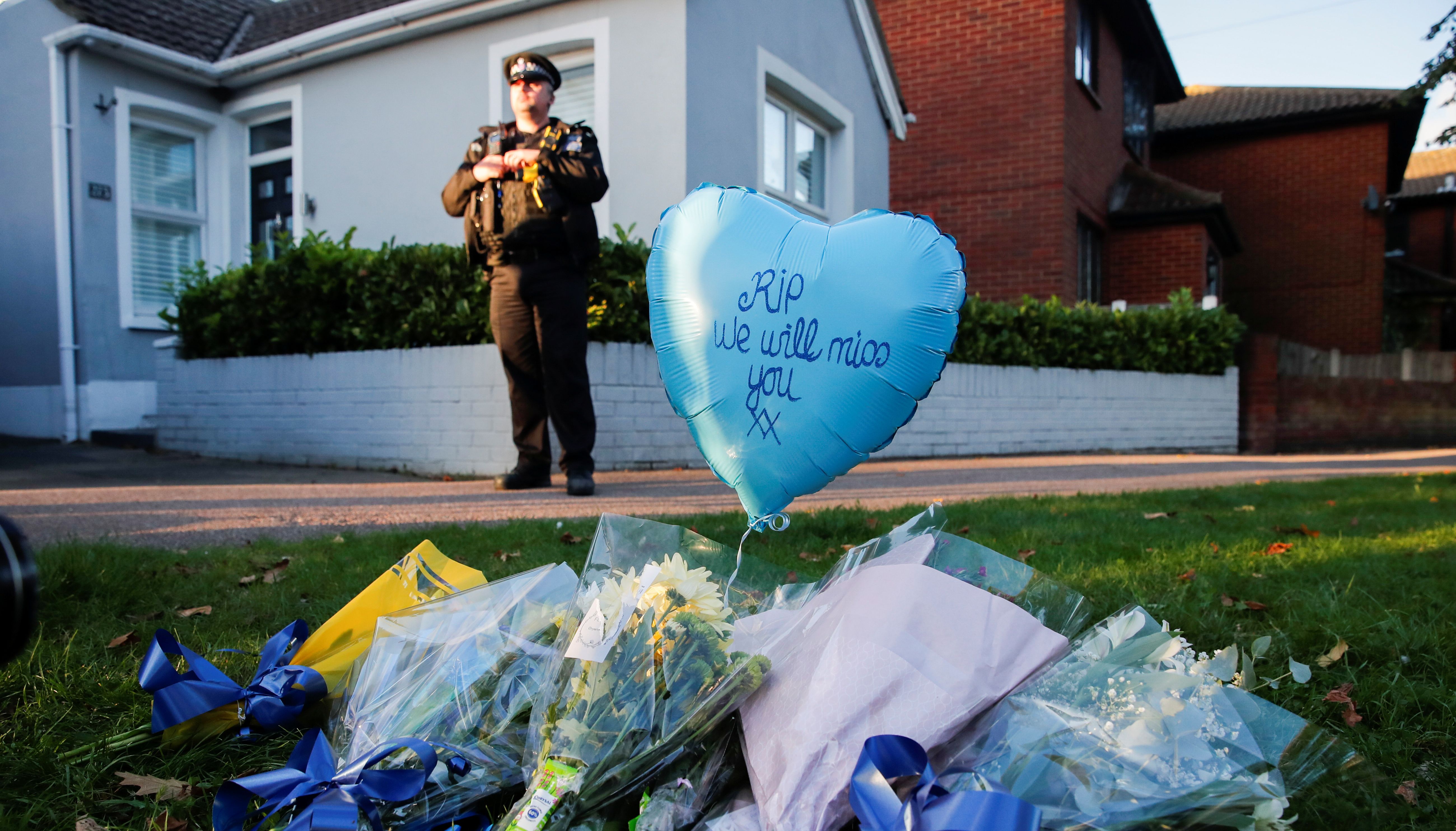 Flowers and a ballon are pictured outside the scene where MP David Amess was stabbed during constituency surgery, in Leigh-on-Sea, Essex.