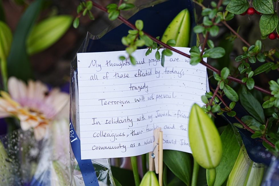 Flowers and messages left at Heaton Park Hebrew Congregation synagogue in Crumpsall