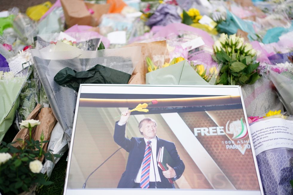 Flowers and tributes left at the scene near Belfairs Methodist Church in Eastwood Road North, Leigh-on-Sea, Essex, where Conservative MP Sir David Amess died