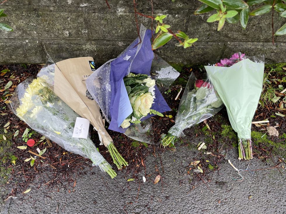 Flowers left outside the house in Pentwyn, Penyrheol, near Caerphilly where Jack Lis a 10-year-old boy was killed by a dog on Monday. The dog was destroyed by firearms officers and no other animals were involved in the attack.