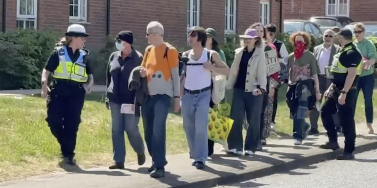 NextImg:Second police force accused of escorting counter-protesters to migrant hotel