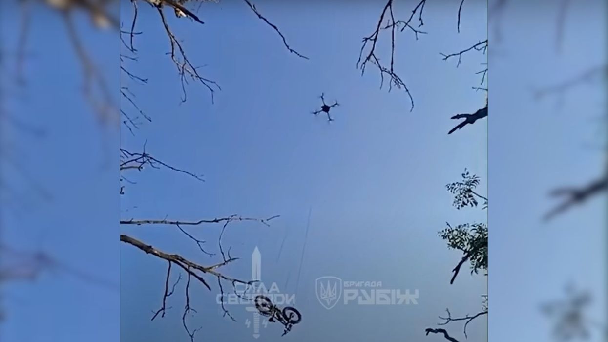 Footage of the e-bike being transported by drone