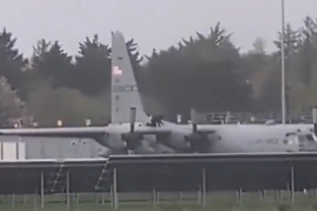 Footage online shows a man attacking the aircraft with a tool