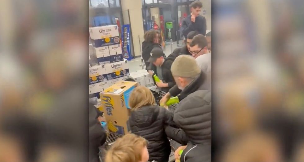 Footage surfaced online showing huge crowds of people fighting to get bottles of Prime