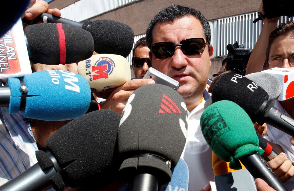 Football agent Mino Raiola speaks to the media as he arrives at FC Barcelona's office.