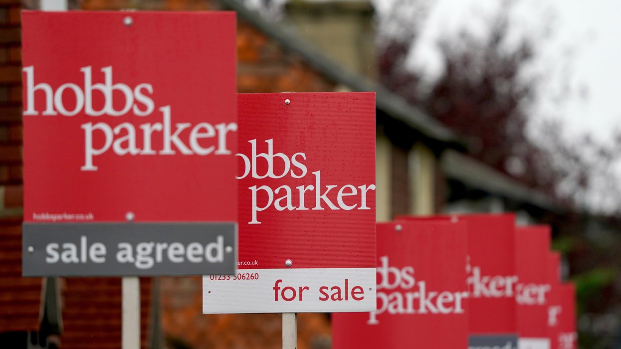 For sale and sale agreed signs in a row