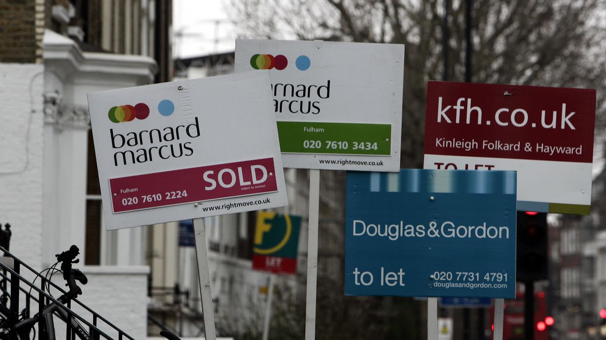 For Sale signs outside houses in Fulham, London