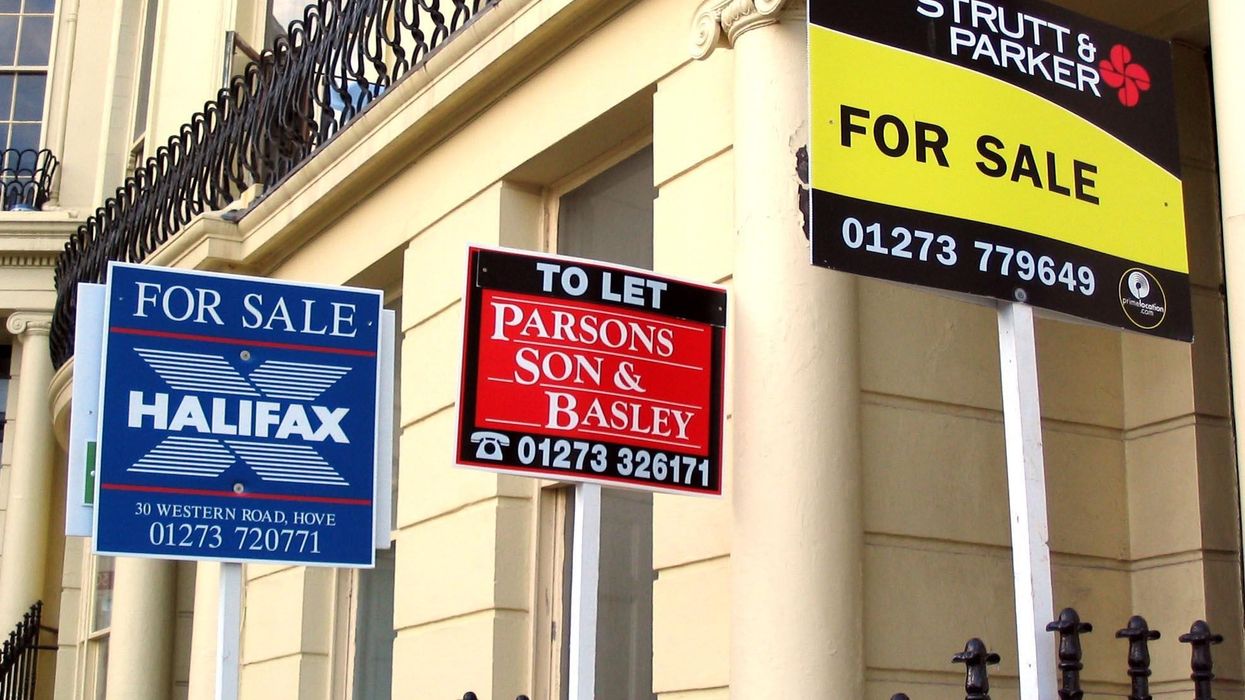 For sale signs outside properties