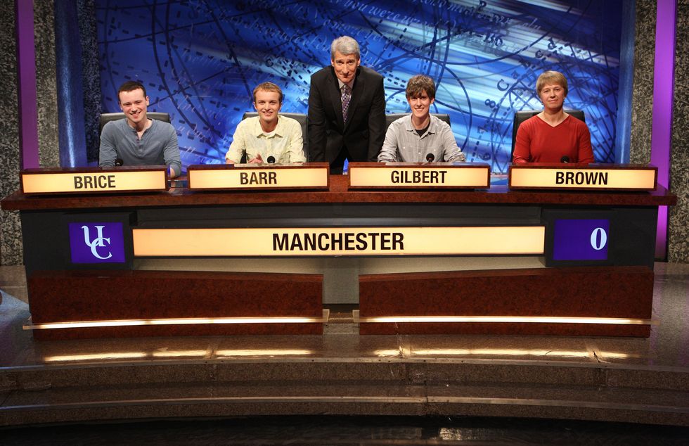 For use in UK, Ireland or Benelux countries only Undated BBC handout photo of of University Challenge's host Jeremy Paxman with the 2013 University Of Manchester team (left to right) David Brice, Adam Barr, Richard Gilbert (Captain), and Deborah Brown. Paxman is to step down as the host of University Challenge after 28 years, the BBC has announced. Issue date: Tuesday August 16, 2022.