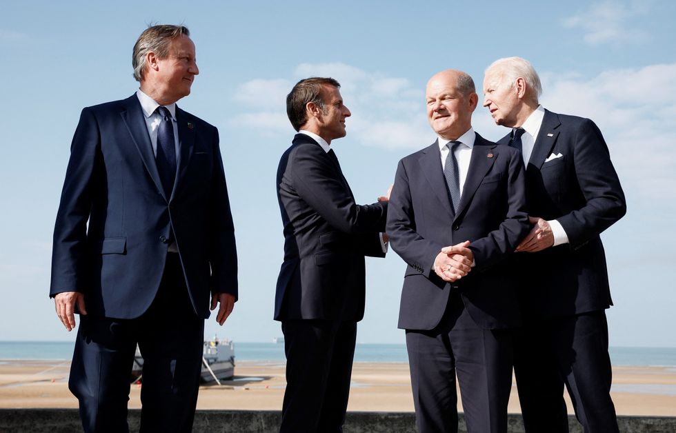 Foreign Secretary David Cameron, French President Emmanuel Macron, German Chancellor Olaf Scholz and U.S. President Joe Biden attend the international ceremony marking the 80th anniversary of the 1944 D-Day landings