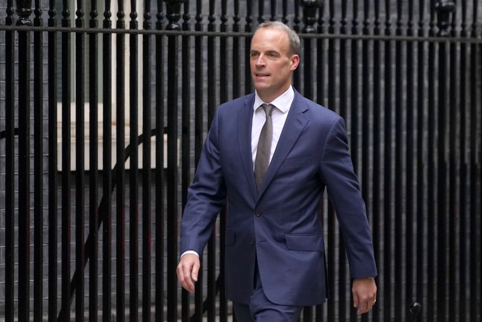 Foreign Secretary Dominic Raab arrives in Downing Street.