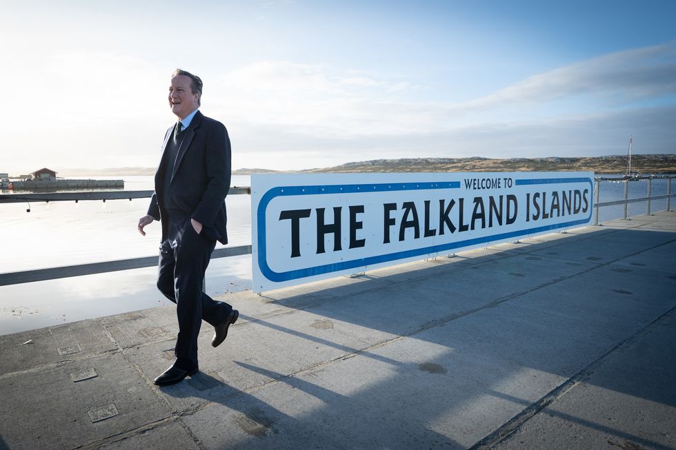 Foreign Secretary Lord David Cameron walks around Port Stanley on the Falkland Islands`