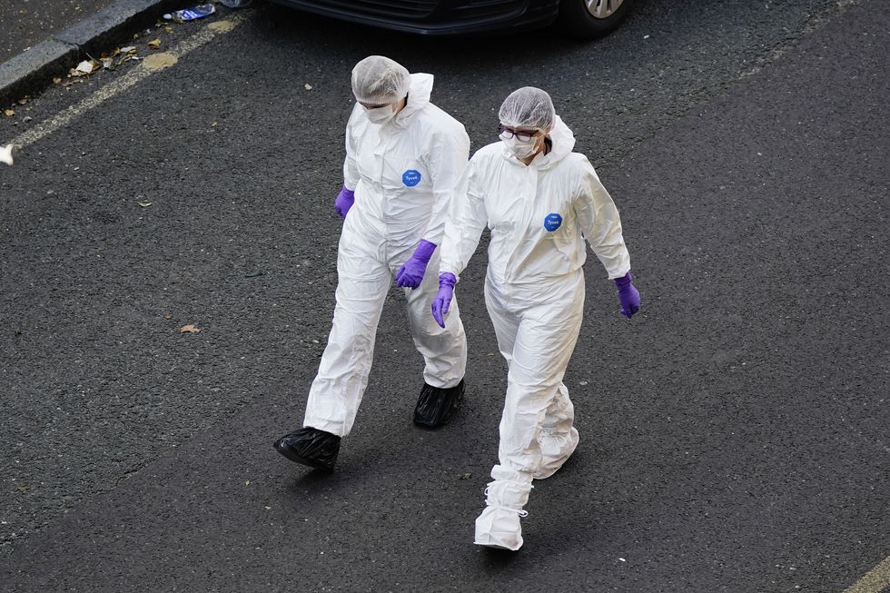 Forensic officers at Regency Court in Brentwood, Essex.
