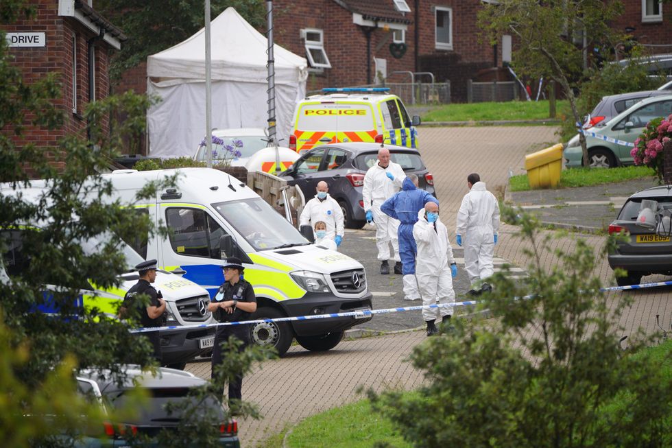 Forensic officers in Biddick Drive in the Keyham area of Plymouth where six people, including the offender, died of gunshot wounds in a firearms incident Thursday evening.