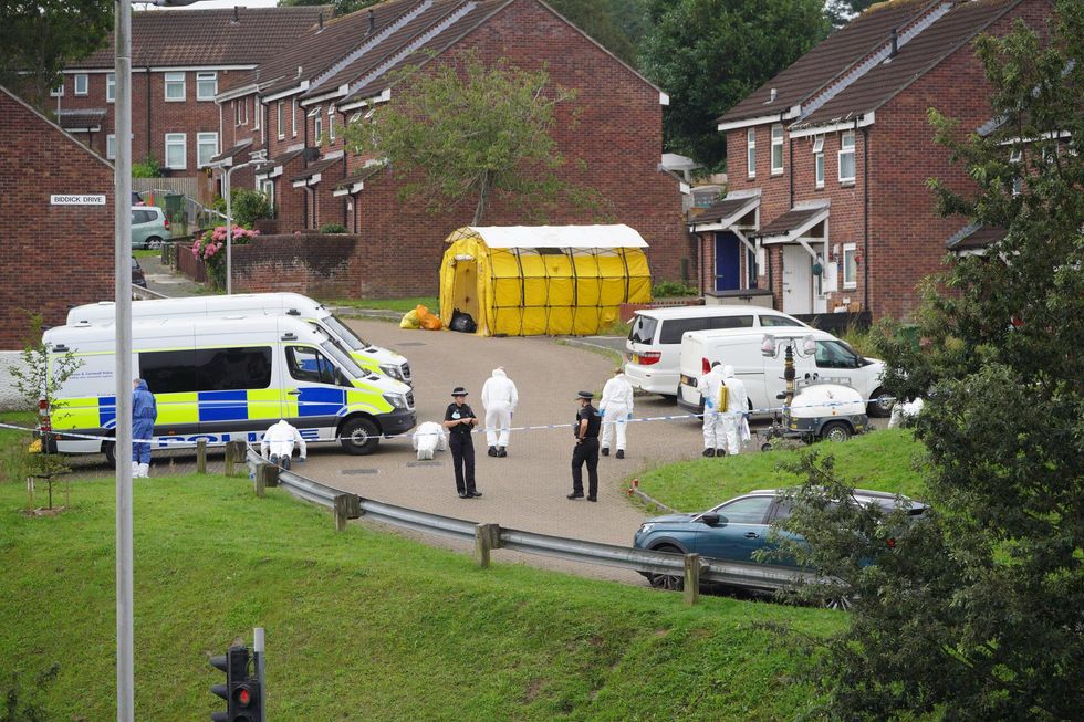 Forensic officers in Biddick Drive in the Keyham area of Plymouth where six people, including the offender, died of gunshot wounds in a firearms incident Thursday evening.