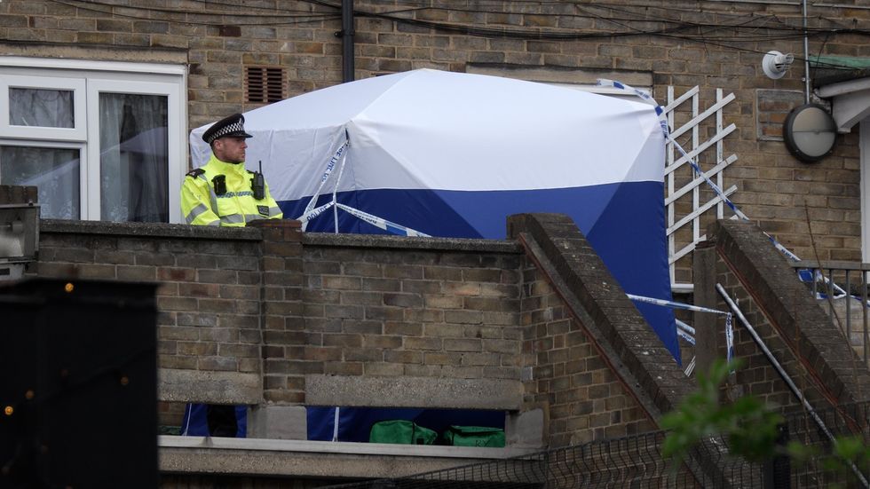 Forensic teams remain at the scene in Woolwich