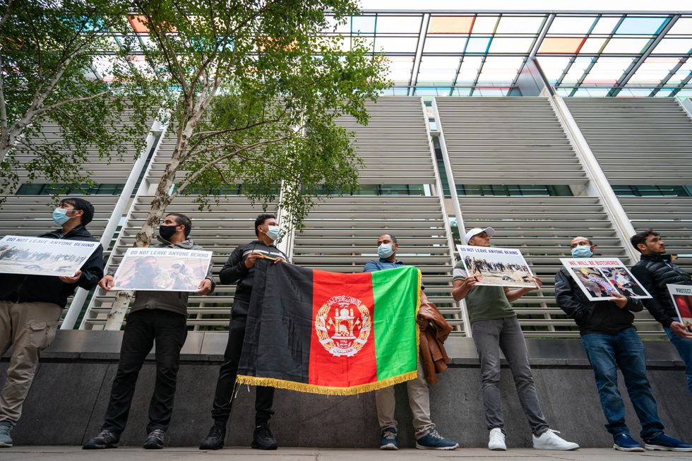 Former Afghan interpreters protest in front of the Home Office in Westminster, central London, demanding that evacuations from Kabul continue.