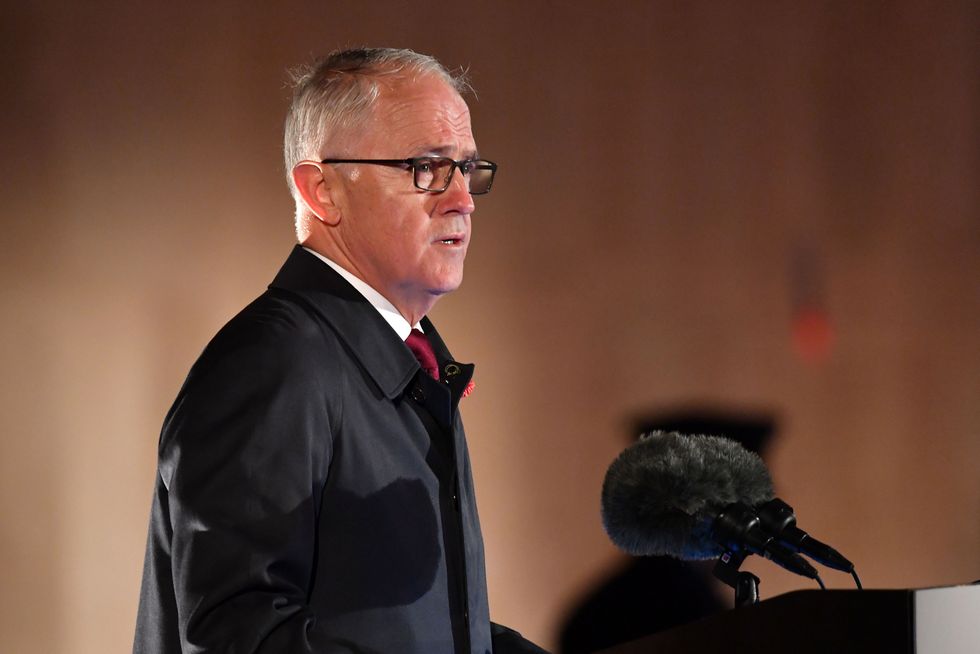 Former Australian Prime Minister Malcolm Turnbull speaks during an early morning memorial at the Villers-Bretonneux Memorial in France