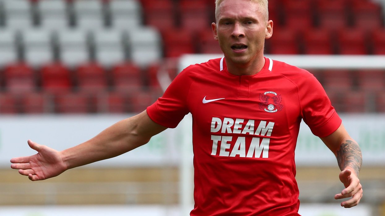 Former EFL footballer on the run as police launch manhunt for armed robbery suspect