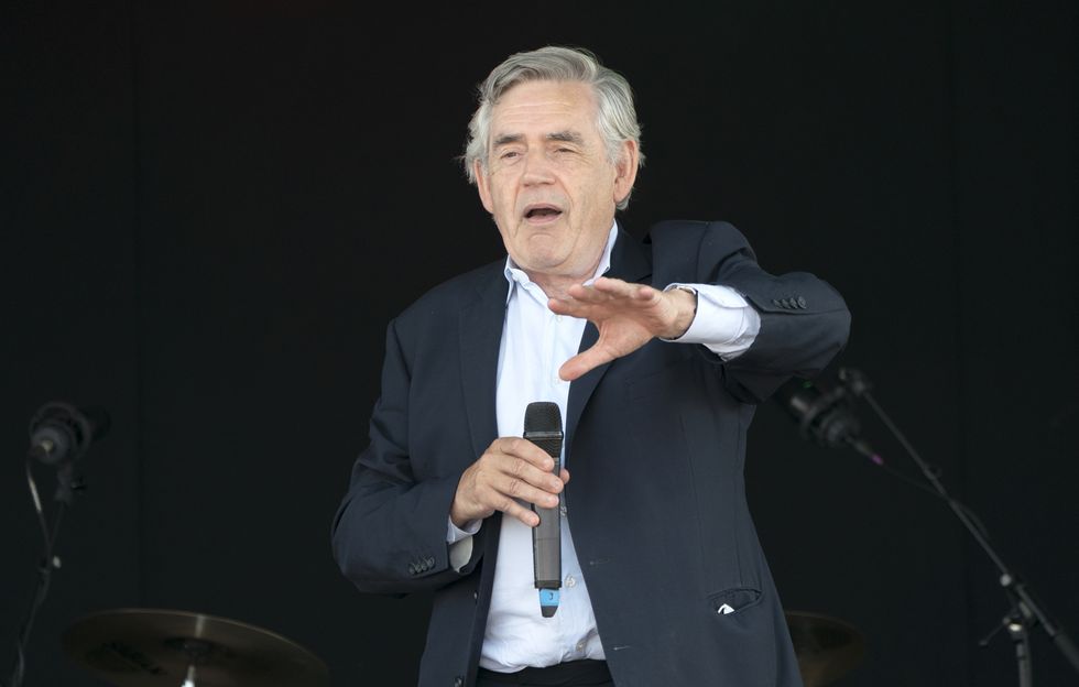 Former Prime Minister Gordon Brown speaks to the crowds and competitors at the Scottish Coal Carrying Championships