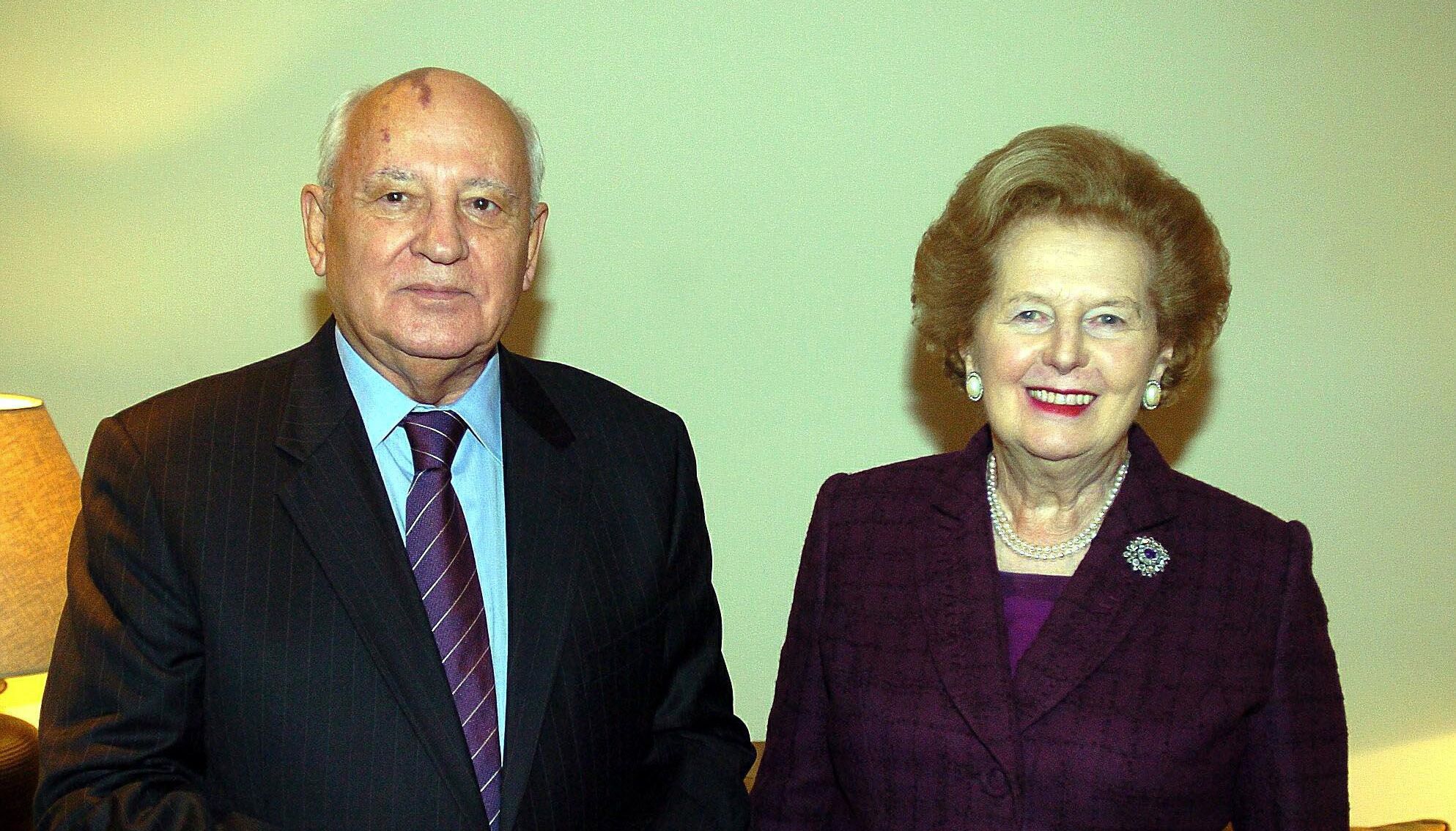 Former Soviet President Mikhail Gorbachev stands with Lady Tharcher during a meeting in Lord Powell's office in London, Wednesday October 19, 2005. PRESS ASSOCIATION Photo. Photo credit should read: Michael Stephens/PA