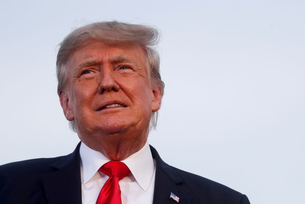 Former U.S. President Donald Trump looks on during his first post-presidency campaign rally at the Lorain County Fairgrounds in Wellington, Ohio, U.S., June 26, 2021. REUTERS/Shannon Stapleton/File Photo/File Photo
