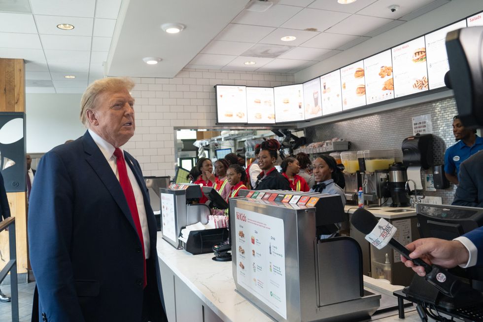 Former U.S. President Donald Trump makes a visit to a Chick-fil-A restaurant