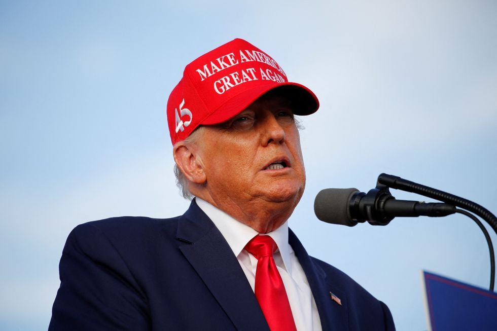 Former U.S. President Donald Trump speaks during a rally ahead of the midterm elections, in Miami, Florida, U.S., November 6, 2022. REUTERS/Marco Bello