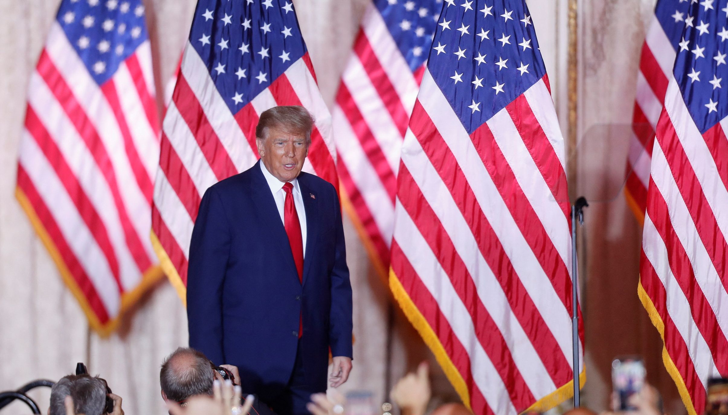 Former U.S. President Donald Trump walks onstage before making an announcement of his plans to run for president in 2024