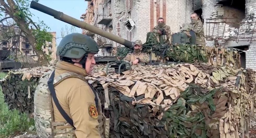 Founder of Wagner private mercenary group Yevgeny Prigozhin talks to Wagner fighters in the course of Russia-Ukraine conflict in Bakhmut