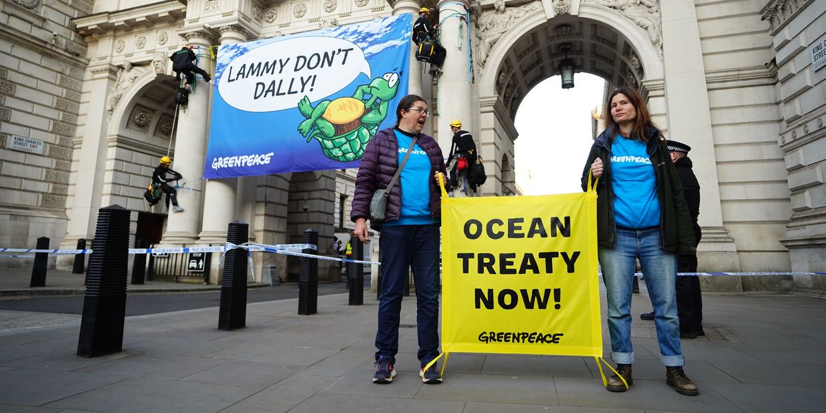 NextImg:Greenpeace eco-warriors climb Foreign Office building over signing of ocean treaty