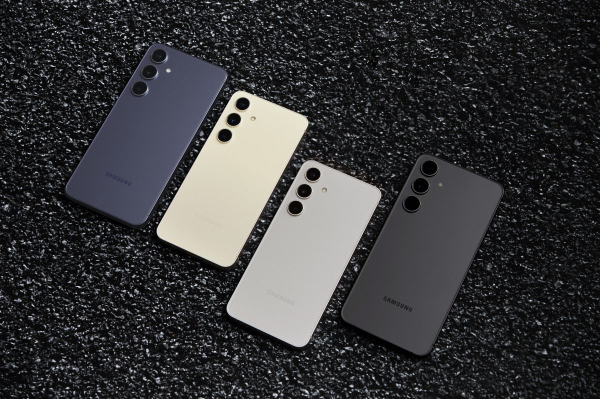 four models of samsung galaxy s24 sat on a textured background