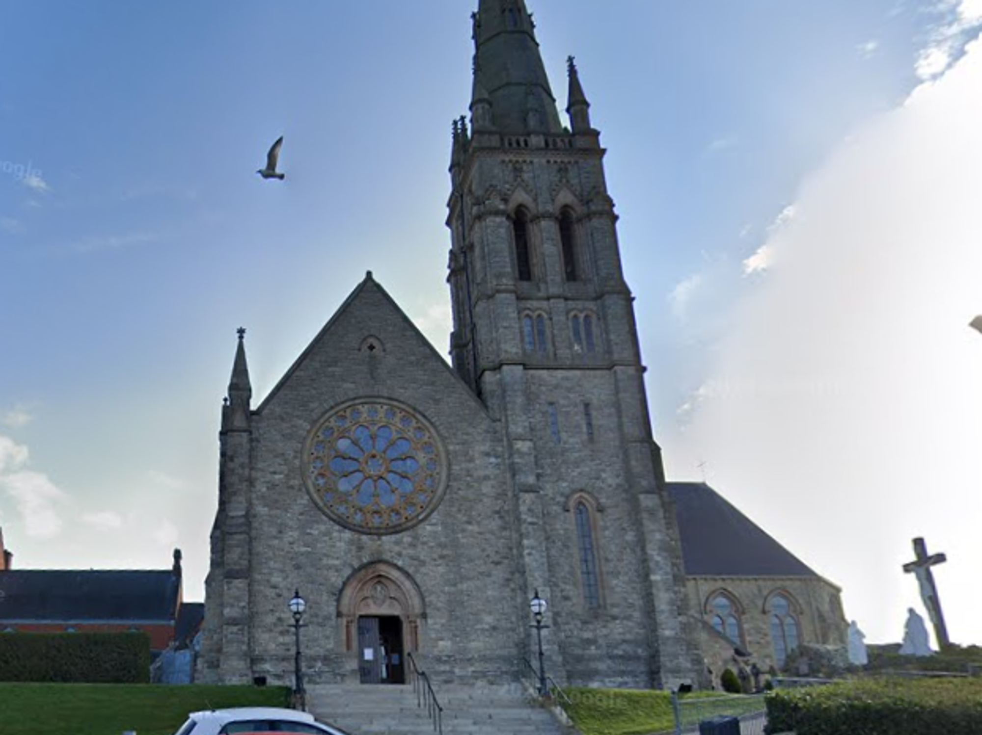 Priest left in 'serious condition' after being attacked in church with bottle