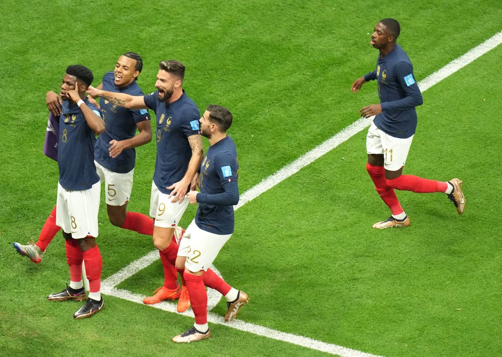 France's Aurelien Tchouameni (left) celebrates scoring their side's first goal of the game during the FIFA World Cup Quarter-Final match at the Al Bayt Stadium in Al Khor, Qatar. Picture date: Saturday December 10, 2022.