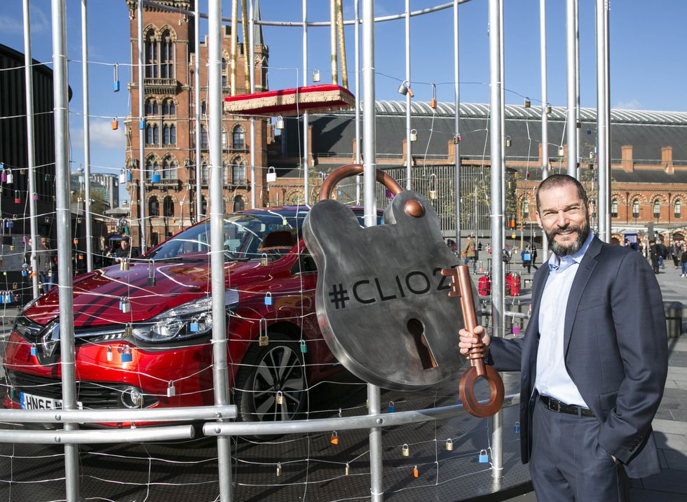 Fred Sirieix from Channel 4 First Dates unveils the Renault Clio Dynamique S car outside King's Cross St. Pancras station in London, to celebrate Clio's 25th anniversary this year.\u200b