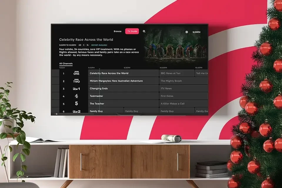 Freely-powered TV mounted to wall