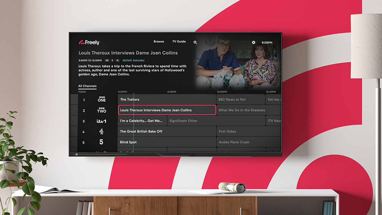 freely tv shown on a flatscreen on a wall with the freely logo in the background