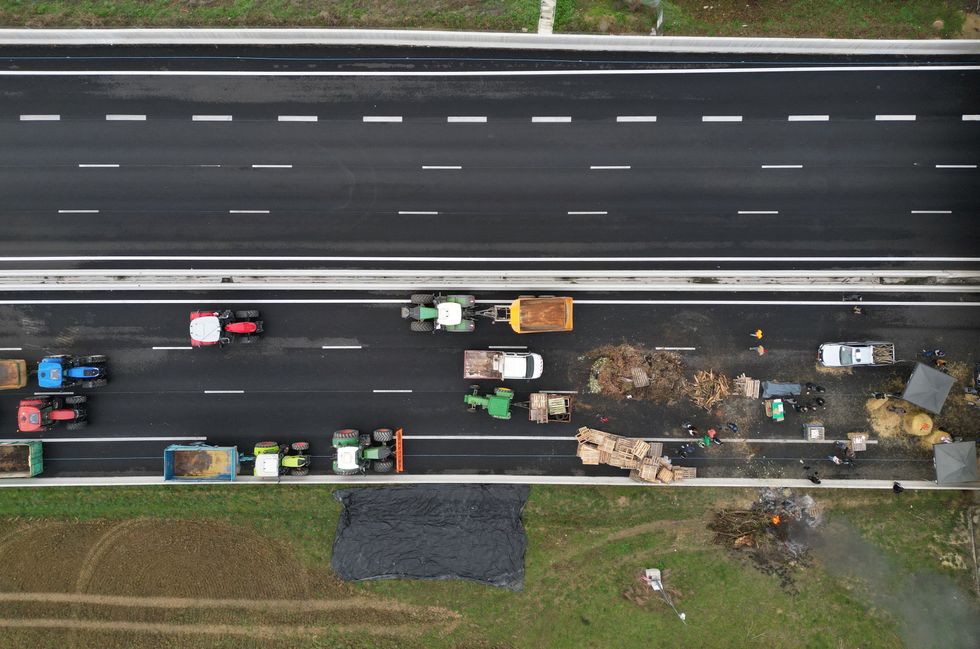 French farmers block the A61 highway with their tractors