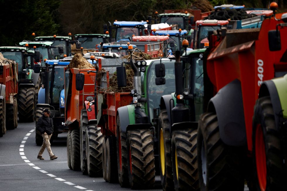 French farmers block the N12 road with their tractors to protest